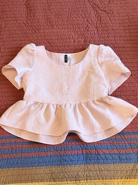 Divided Light Pink Textured Peplum Crop Top